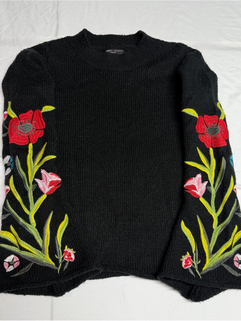 Romeo & Juliet Couture Black Crewneck Sweater with Red Floral Embroidery
